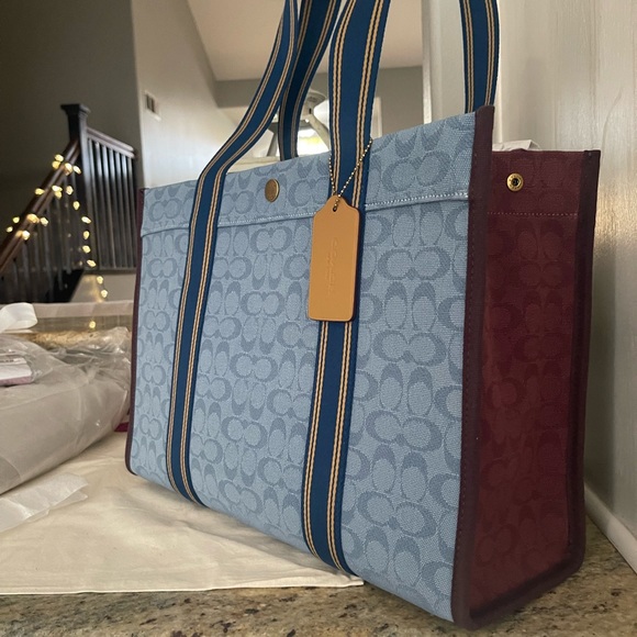 Coach Handbags - New coach large denim 💙 tote Jacquard Spin Tote 42